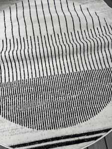 5'3" ROUND Corum Abstract Black/Ivory Area Rug