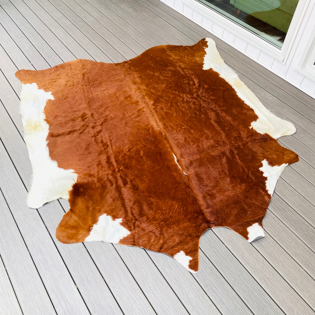 6’9” x 8 ft Natural Cowhide Area Rug