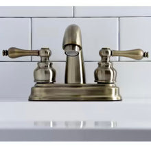 Load image into Gallery viewer, Kingston Brass Restoration 4 in. Centerset Bathroom Faucet, Antique Brass