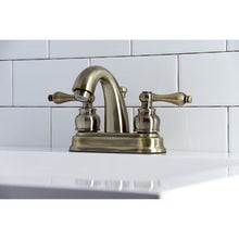 Load image into Gallery viewer, Kingston Brass Restoration 4 in. Centerset Bathroom Faucet, Antique Brass